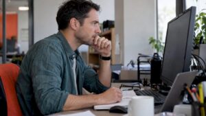 Analyst reviewing click records and server logs