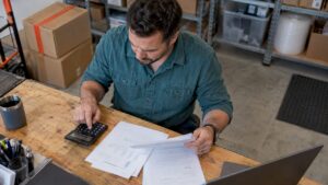 Small-business owner compares advertising and management costs