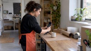 Small business owner filming a product demonstration